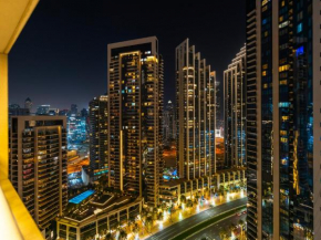 3BR with Gaming Lounge, Burj Khalifa, Fountain View